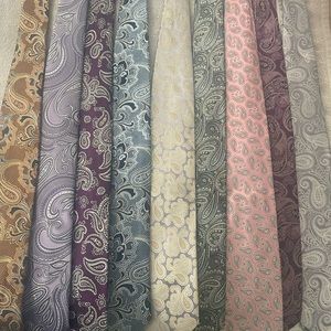 9 Woven Paisley ties. Different designers. Like new.  All silk Sold in a set